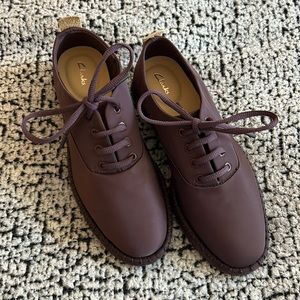 Women’s size 7 Purple Lace Up Shoes